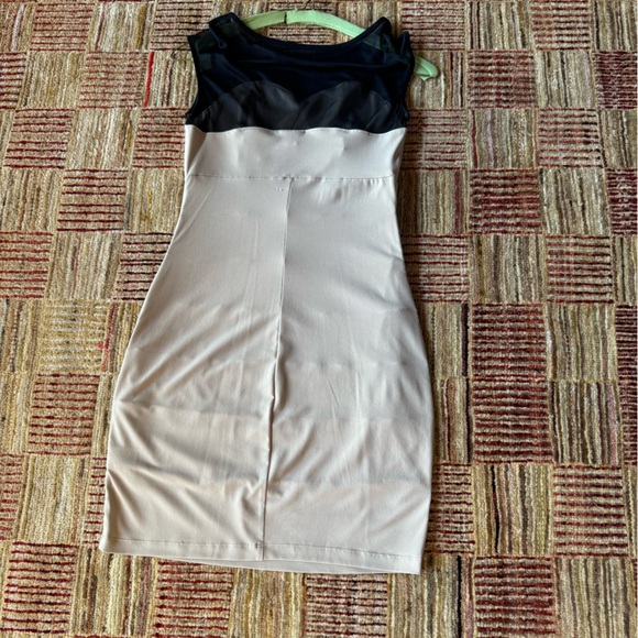 Ladies small cocktail dress.  Tan layered knit with black mesh shoulders. - Picture 2 of 2
